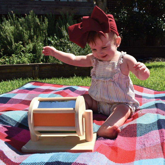 Montessori Spinning Drum being enjoyed my a young baby